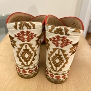 Embroidered stacked heel